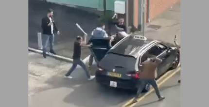 POLICE INVESTIGATE DAYLIGHT AMBUSH AFTER GANG ATTACKS TAXI AND PASSENGER IN STOKE ON TRENT
