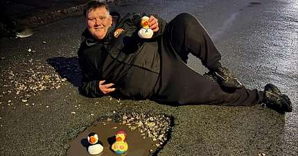 CREWE CABBIE MAKES A SPLASH WITH RUBBER DUCK POTHOLE PROTEST