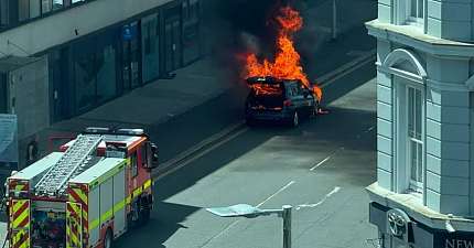 EXPLOSIONS HEARD AS TAXI BURSTS INTO FLAMES OUTSIDE PLYMOUTH HOTEL