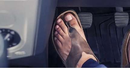 IS IT LEGAL TO DRIVE WEARING FLIP FLOPS OR SLIDERS