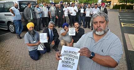 WE ARE UNABLE TO WORK WOLVERHAMPTON DRIVERS MEET TO PROTEST LICENCE DELAYS